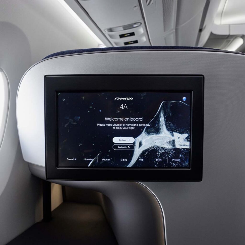 Finnair business class seatback with Panasonic's embedded IFE screen.