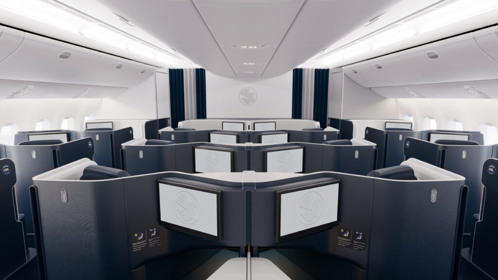 Business Class cabin on Air France's Boeing 777-300ER. The cabin is a 1-2-1 configuration of blue seats with white thermoplastic shells (and navy on the other side).