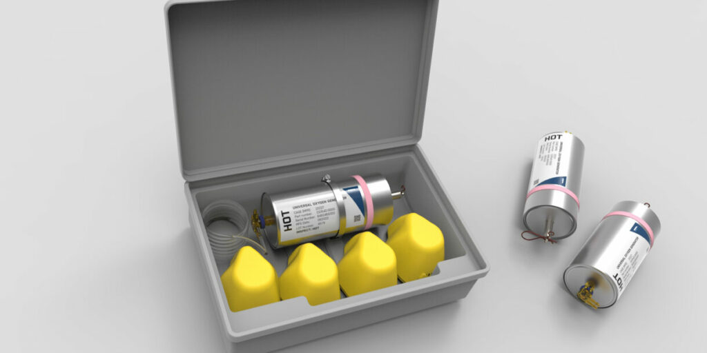 Diehl Aviation's Universal Oxygen Generator is shown packed into a grey box lying on a grey surface