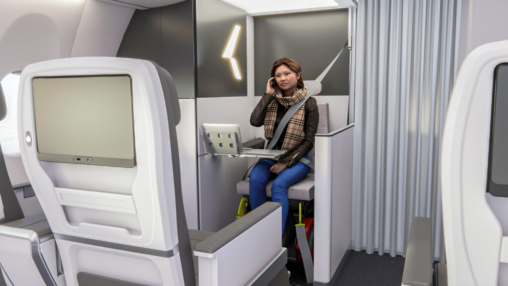 A woman is on her mobile device parked in the Fly Your Wheels Suite. She is facing the front row of first class.