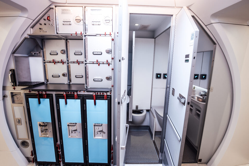 Diehl Aviation's Skypax galley-lav combo is seen here onboard an aircraft. The two lavs sit side-by-side, and feature a swinging partition to support access for wheelchair users