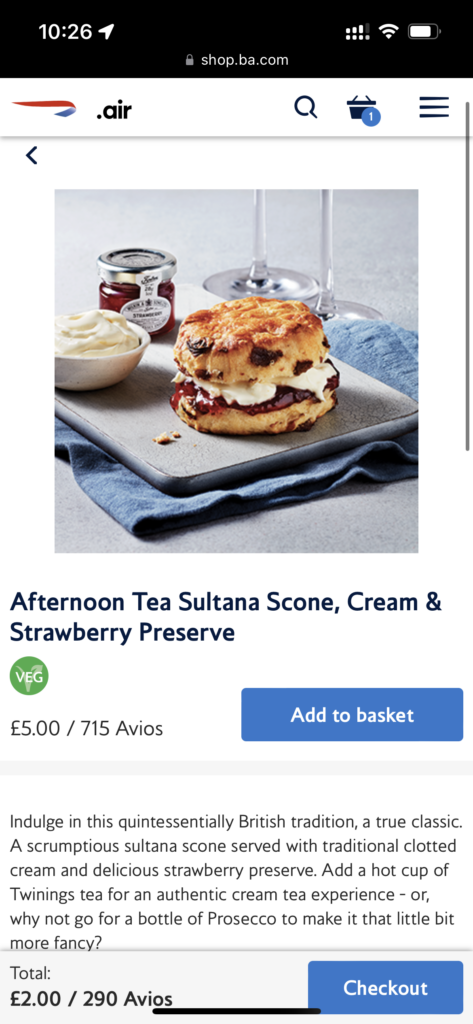 A screenshot of the economy class buy-on-board menu shows an afternoon tea scone plus fixings