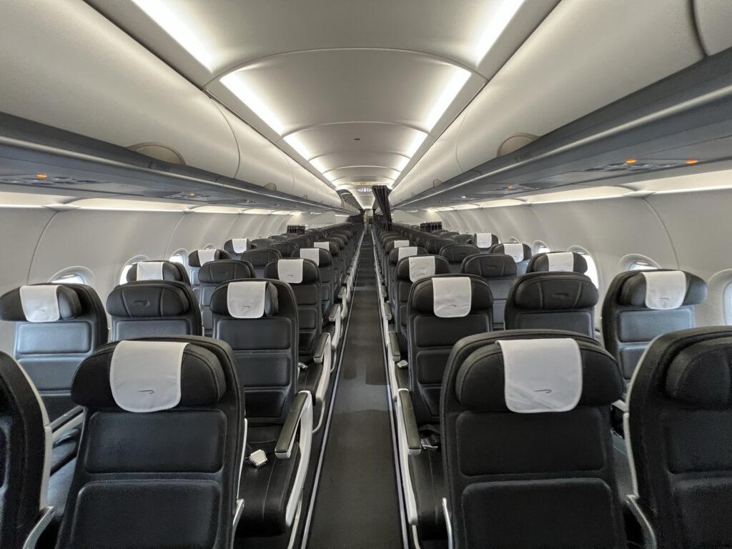 The cabin interior of the British Airways A320neo is in a 2-3 layout with all grey seats.