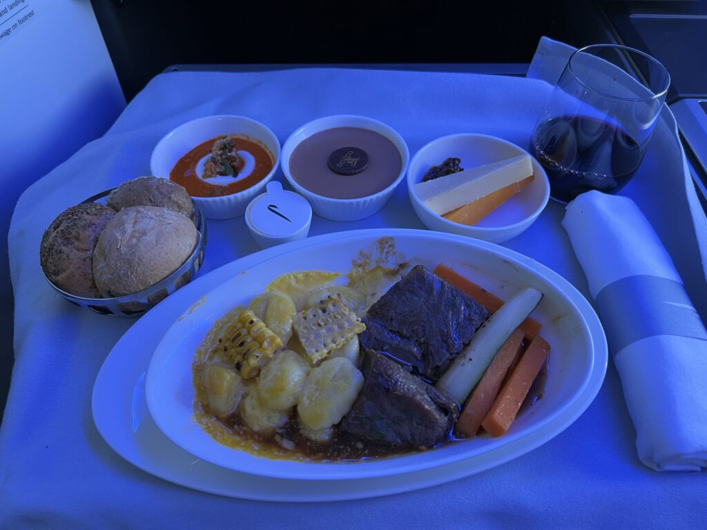 A meal of beef and gnocchi onboard British Airways