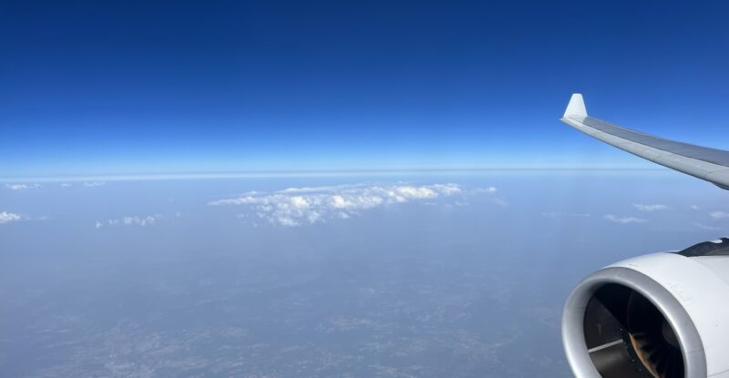 Iberia A330-200 aircraft in flight over the ocean.