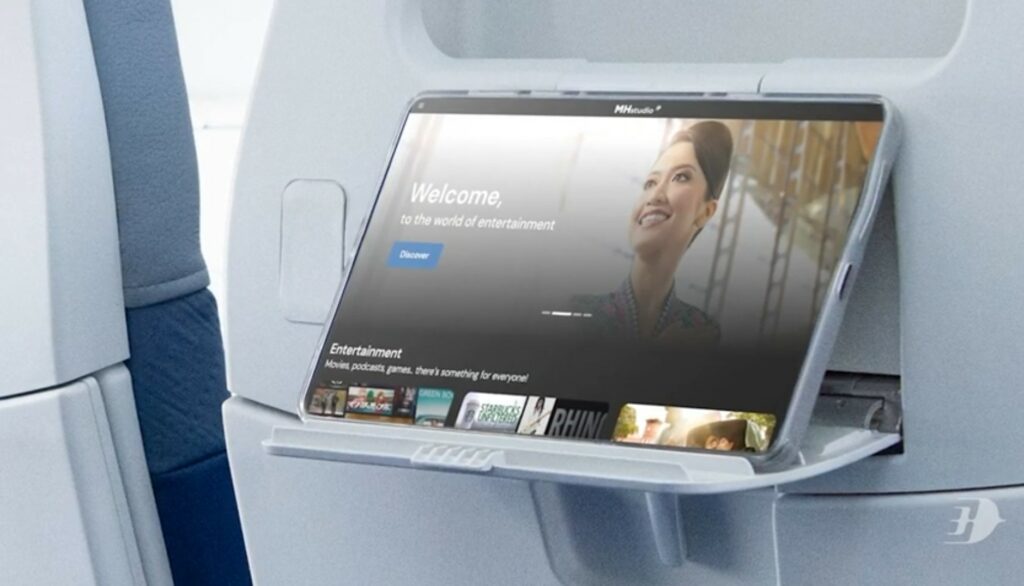 Malaysia Airlines Boeing 737-800NG tablet holder with a passenger's tablet positioned on it.