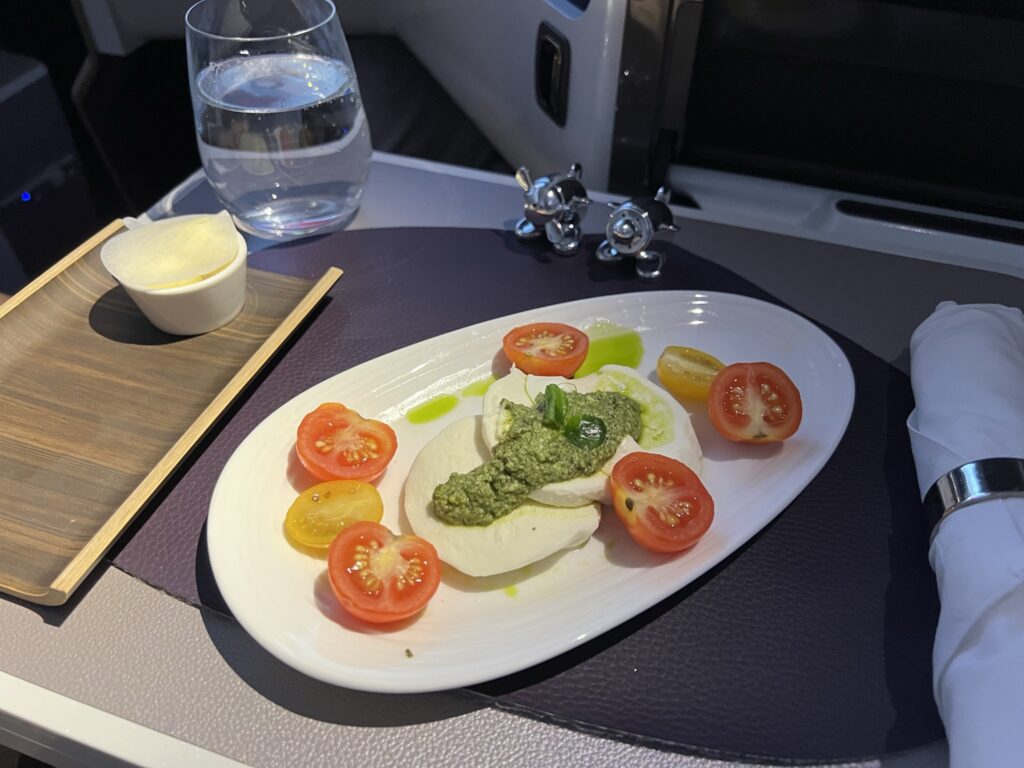 A light meal of tomatoes and mozzarella cheese in Upper Class onboard the Virgin Atlantic A350-1000