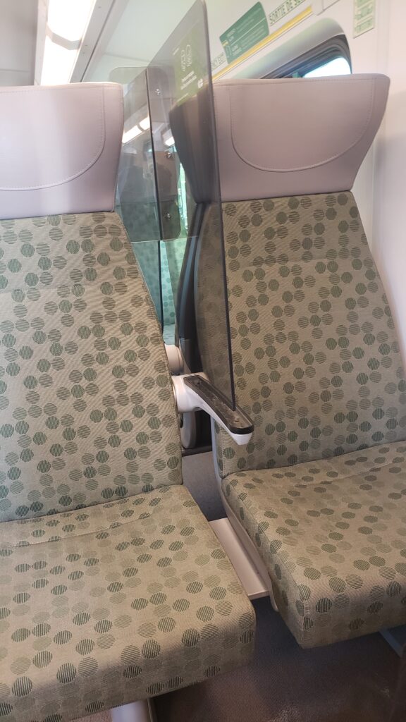 A close up of the seat showing the plastic dividers now in place on the GO Transit lines