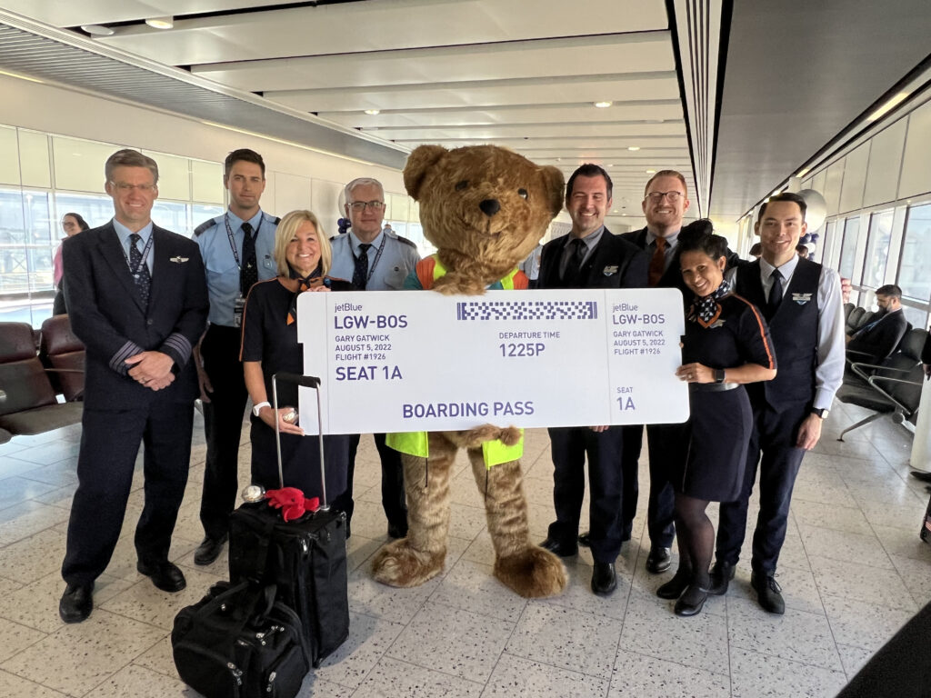 The JetBlue crew snap a photo with Gatwick's mascot before the LGW-BOS flight