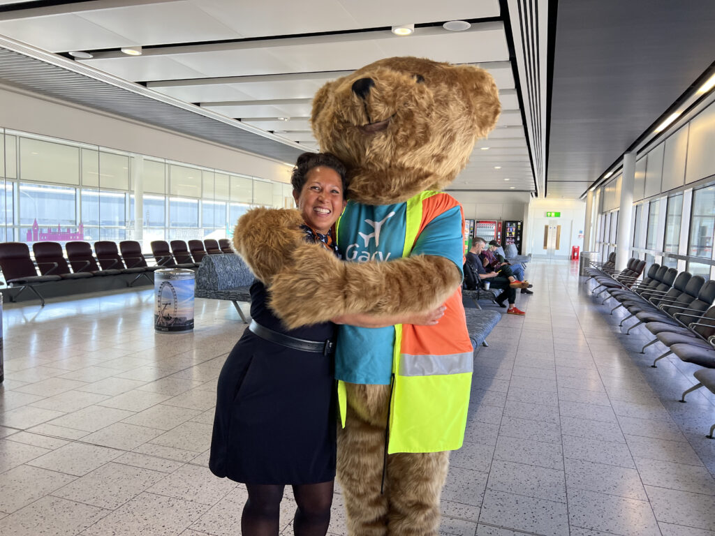 Gary Gatwick hugs a flight attendant in this photo