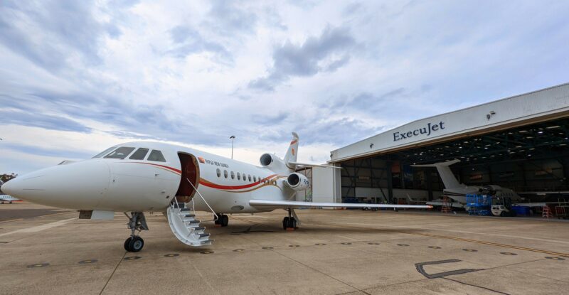 Air Niugini Falcon 900 VIP aircraft in front of ExecuJet MRO Services hangar in Sydney