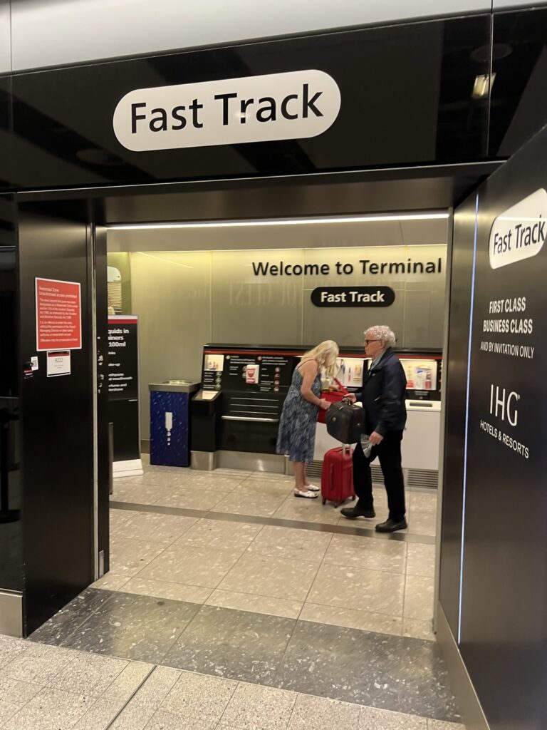 A sign above an entryway says "fast track"