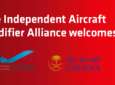 "The Independent Aircraft Modifier Alliance welcomes" text with SAUDIA's logos on an orange background.