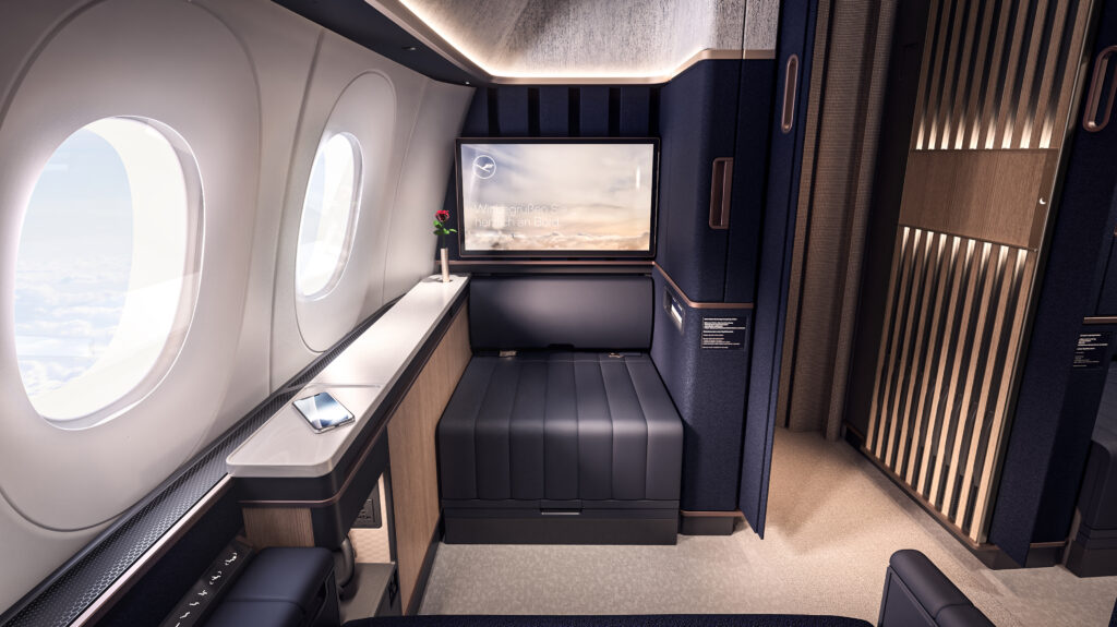 Lufthansa first class suite in the new Allegris brand line with a stunning palette of navy blue, and warm tones. Image: Lufthansa Group