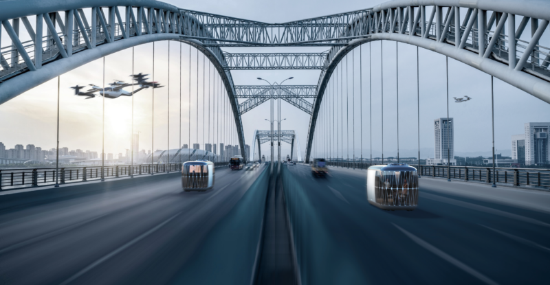 Futuristic vehicles are driving over a bridge. Image: Supernal