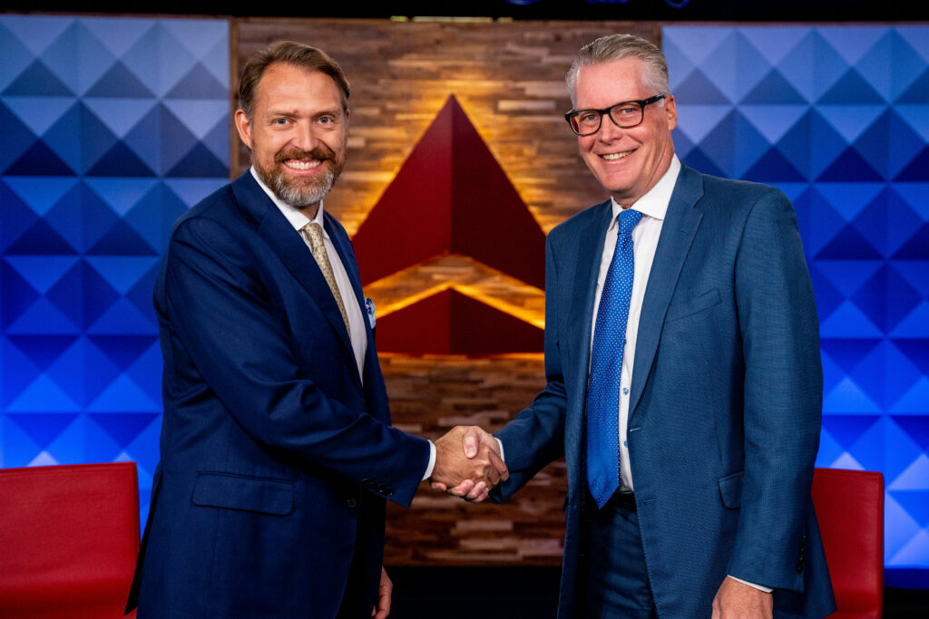 Joby Aviation founder and CEO JoeBen Bevirt (left) and Delta CEO Ed Bastian mark the companies’ agreement with a handshake. Image: Rank Studios/Joby