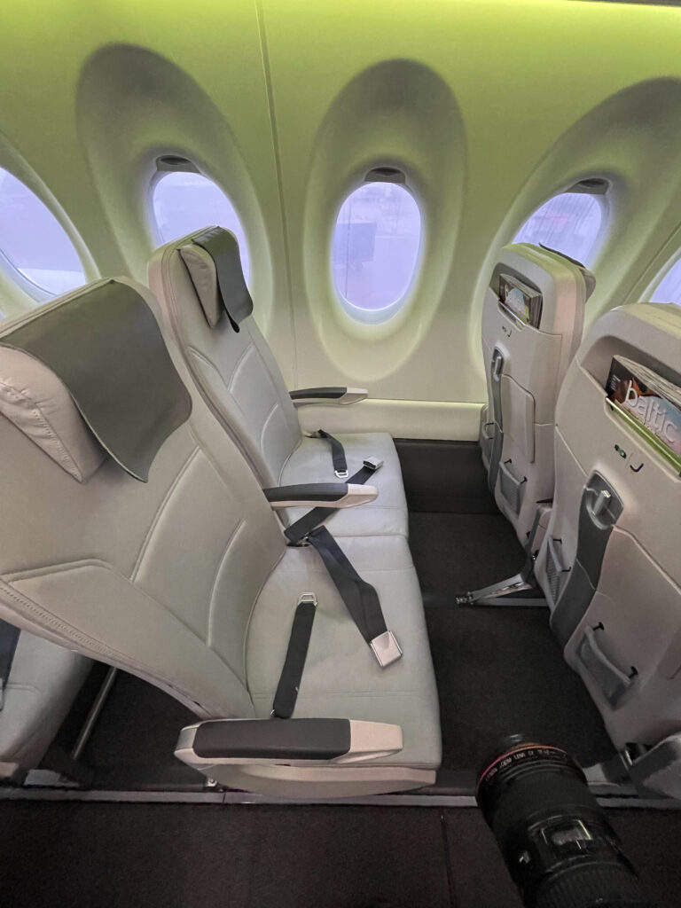 airBaltic aircraft interior is all grey with dark grey accents.