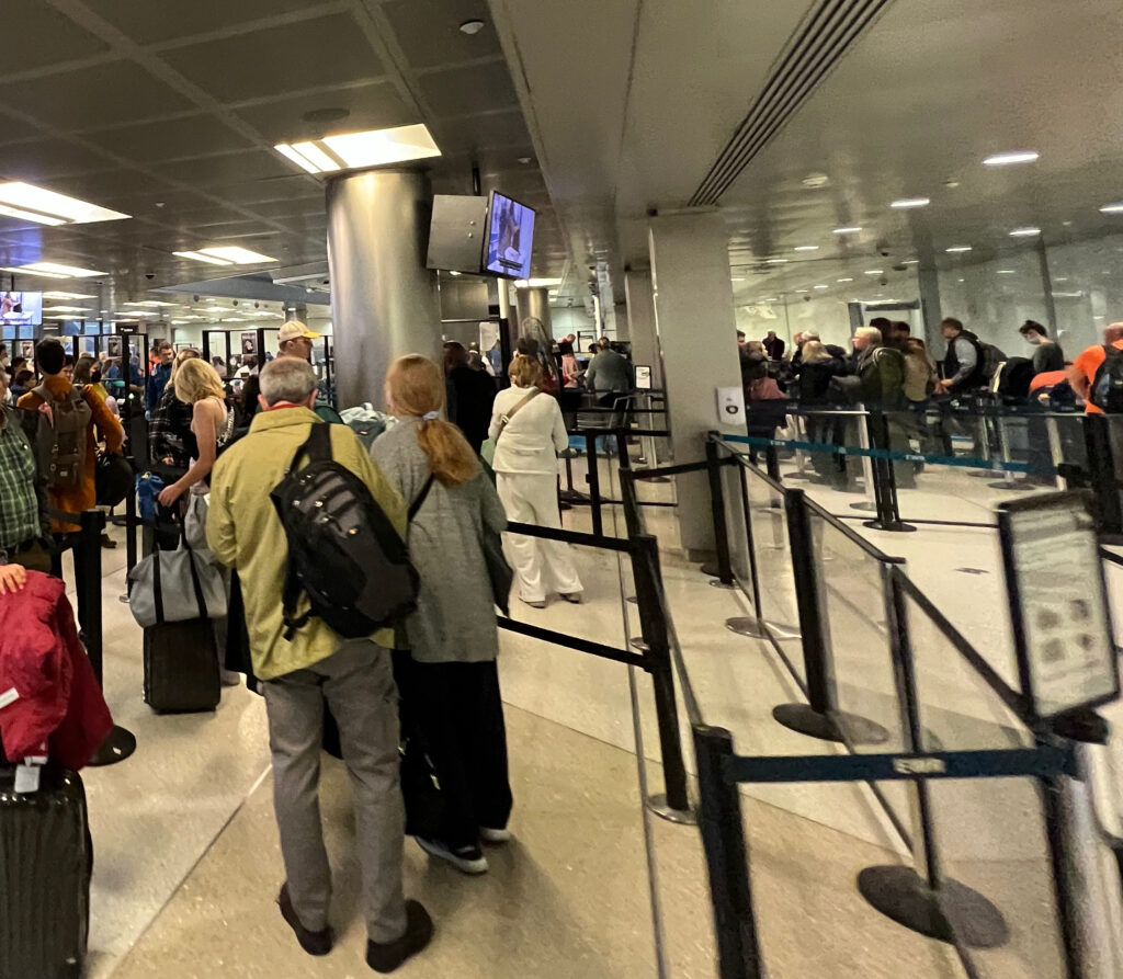 A line of passengers, waiting to be processed at the TSA checkpoint