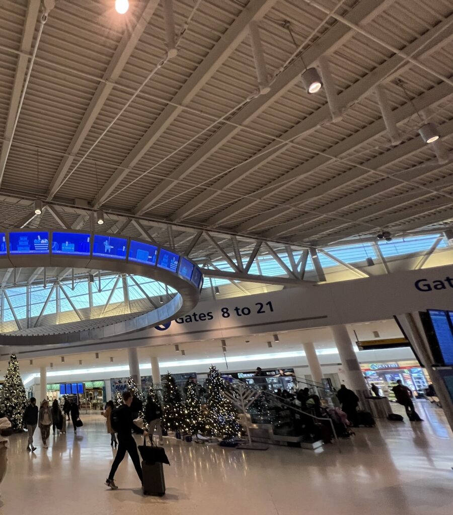 JFK Terminal 5 is busy with holiday travelers.