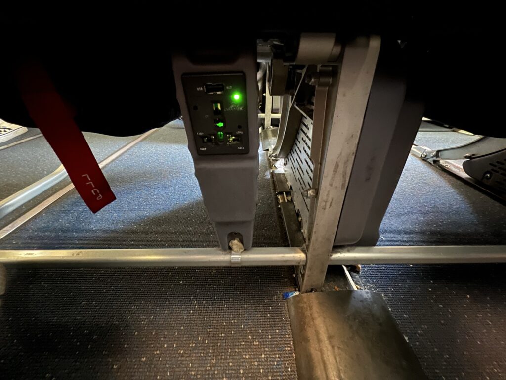 In-seat power on the JetBlue aircraft is hard to spot, under the seat.