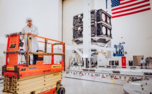 Lowering satellites by Boeing into container