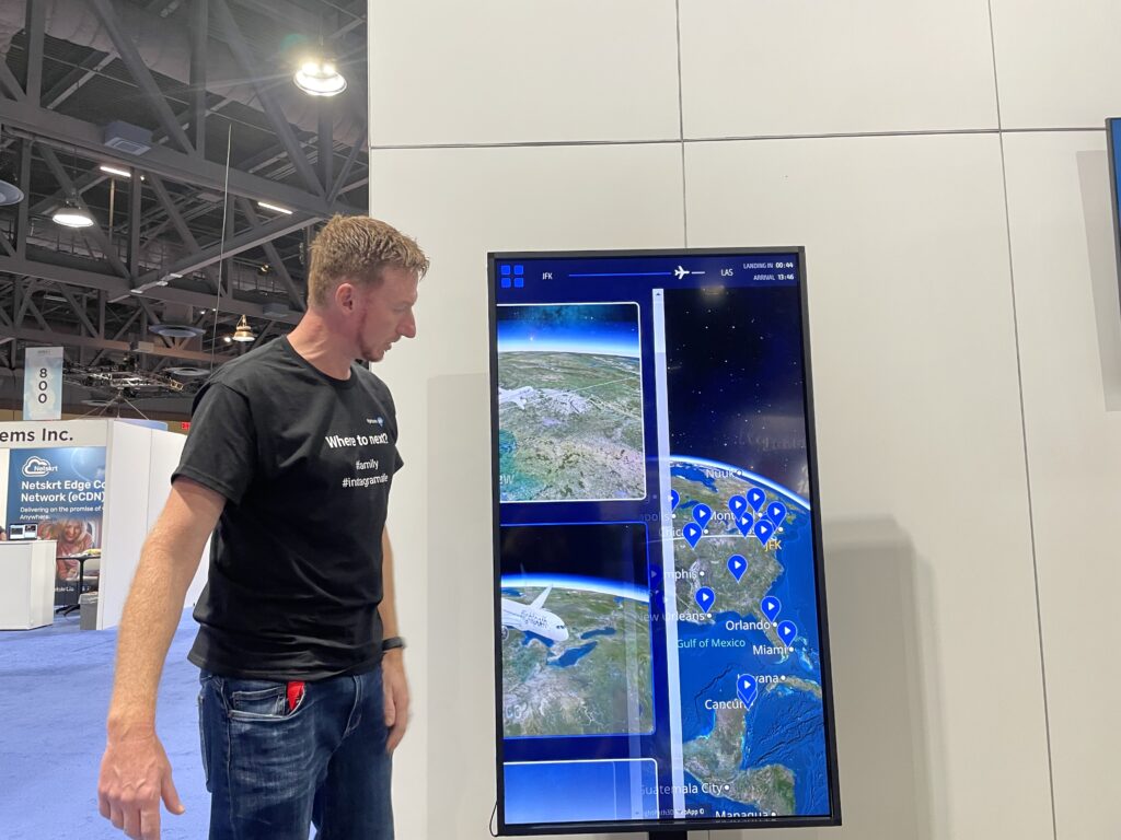 FlightPath3D CEO Duncan Jackson demonstrating the moving map on a large display monitor during the APEX EXPO in Long Beach