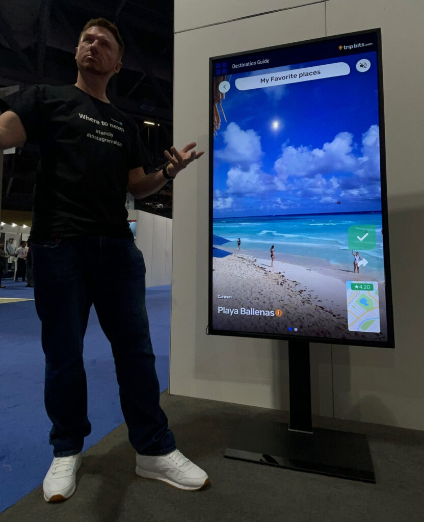 FlightPath3D CEO Duncan Jackson demonstrating the moving map on a large display monitor during the APEX EXPO in Long Beach