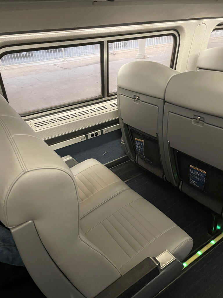 Close up of the the grey Amtrak seats which appear quite thick and comfortable.