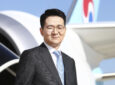 Chairman and CEO of Korean Air, Walter Cho standing in front of a B787-9.
