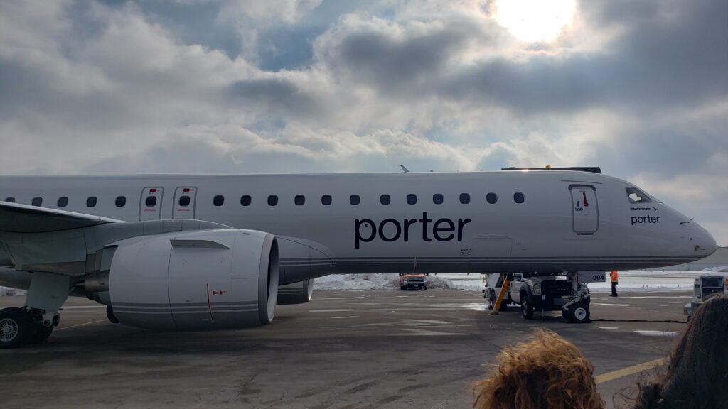 Porter Airlines' E2 parked and ready for boarding at the FBO by Toronto Pearson