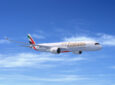 Emirates A350-900 in flight in a clear blue sky. The A350s will be equipped with GX Aviation connectivity