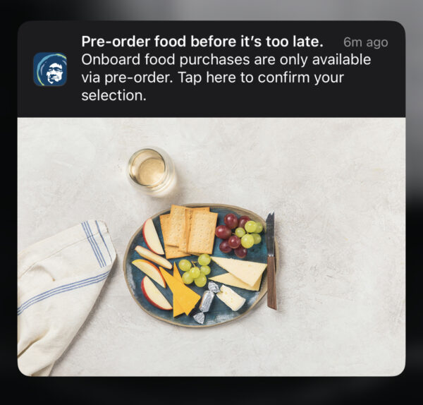 An Alaska push notification to a mobile device reminding passengers to pre-order food.