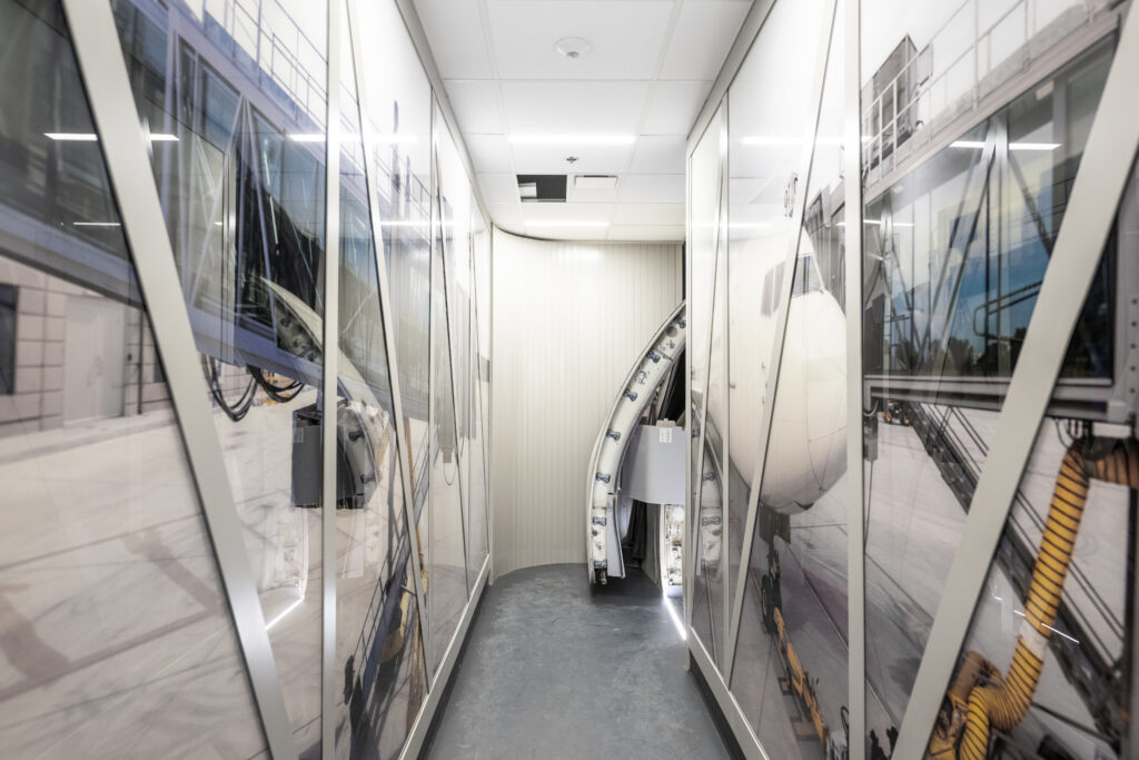 Kansas City International Airport's simulated glass jet bridge walkway.