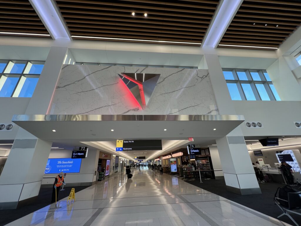 Bright light from large windows, and creative LED lights embedded in the ceiling and ceiling edges, create an interesting and calming ambiance at Terminal C.