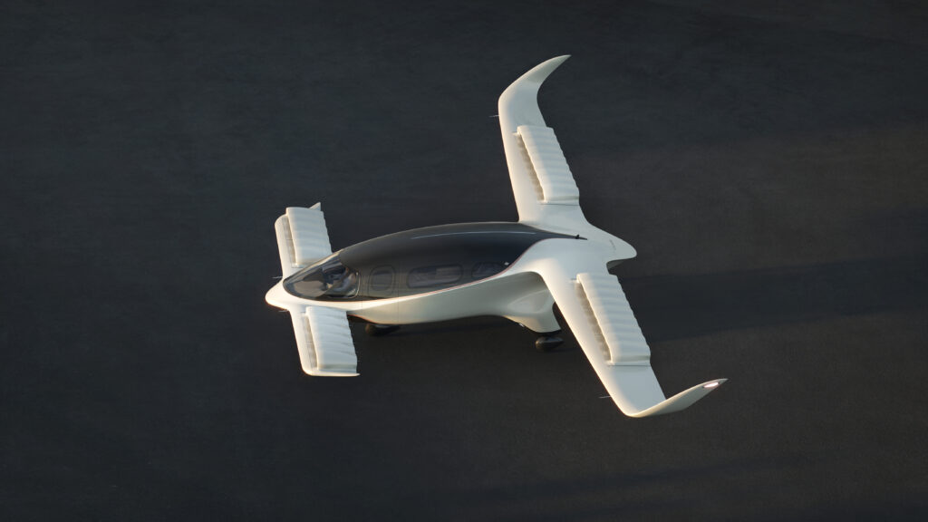 The Lilium Jet, seen here parked on a landing pad, is a sleek futuristic looking eVTOL aircraft with a tinted window dome and a white exterior. 