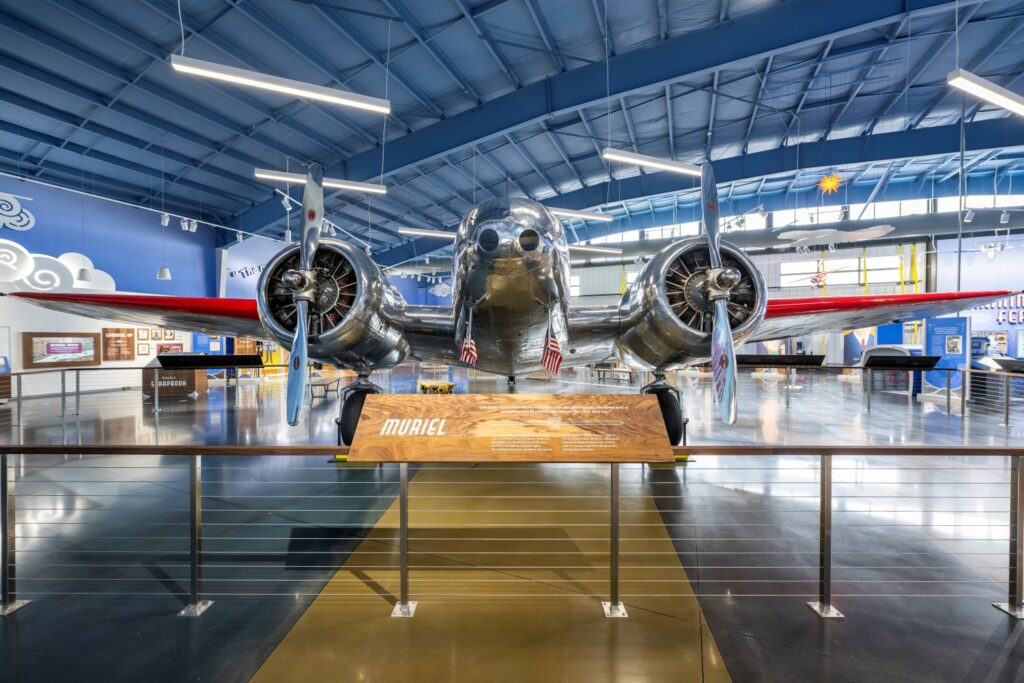 World's Last Remaining Lockheed Electra 10-E. The aircraft is silver with red accent. Image: Dimensional Innovations/The Amelia Earhart Hangar Museum