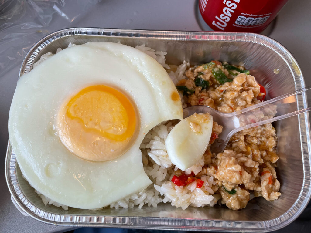 Nok Air's chicken fried rice meal with a egg on top.