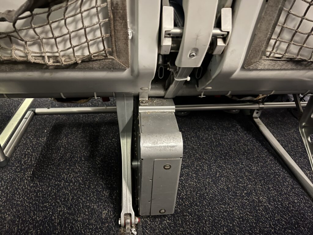 Equipment box under the middle seat of Alaska Airlines' 737-800