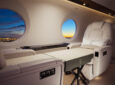 Primadonna FlexFrame in use on an aircraft. A beautiful sunset is seen outside the aircraft window.