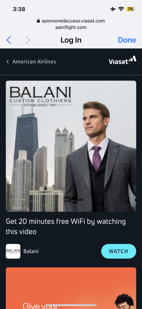 Screen shot of Balani advert on American Airlines' Viasat-powered portal. A man is seen in a smart suit, standing in front of the NY skyline.