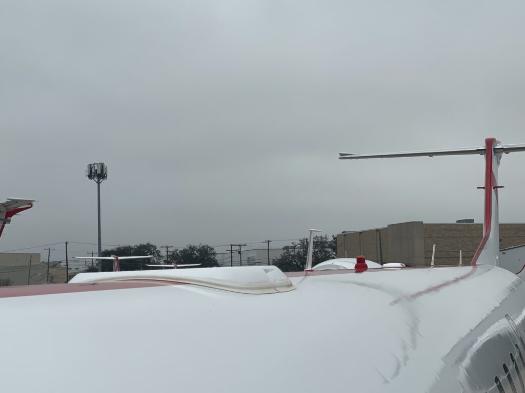 The slimline phased array antenna atop the fuselage.