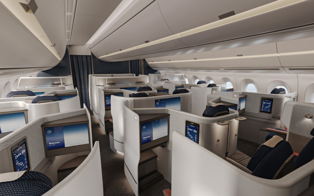 Lufthansa Allegris business class cabin, grey with a bit of brown and blue touches