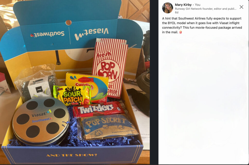 Southwest and Viasat co-branded box with popcorn, twizzlers and other movie-themed goodies