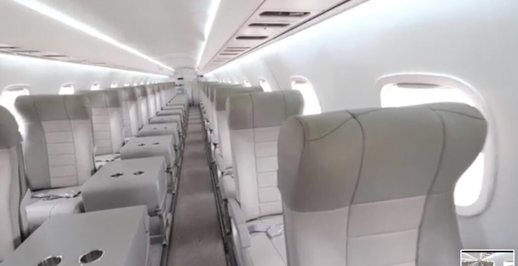 JSX ERJ-145 empty cabin in 1-1 configuration with side tables and cup holders on the right side.