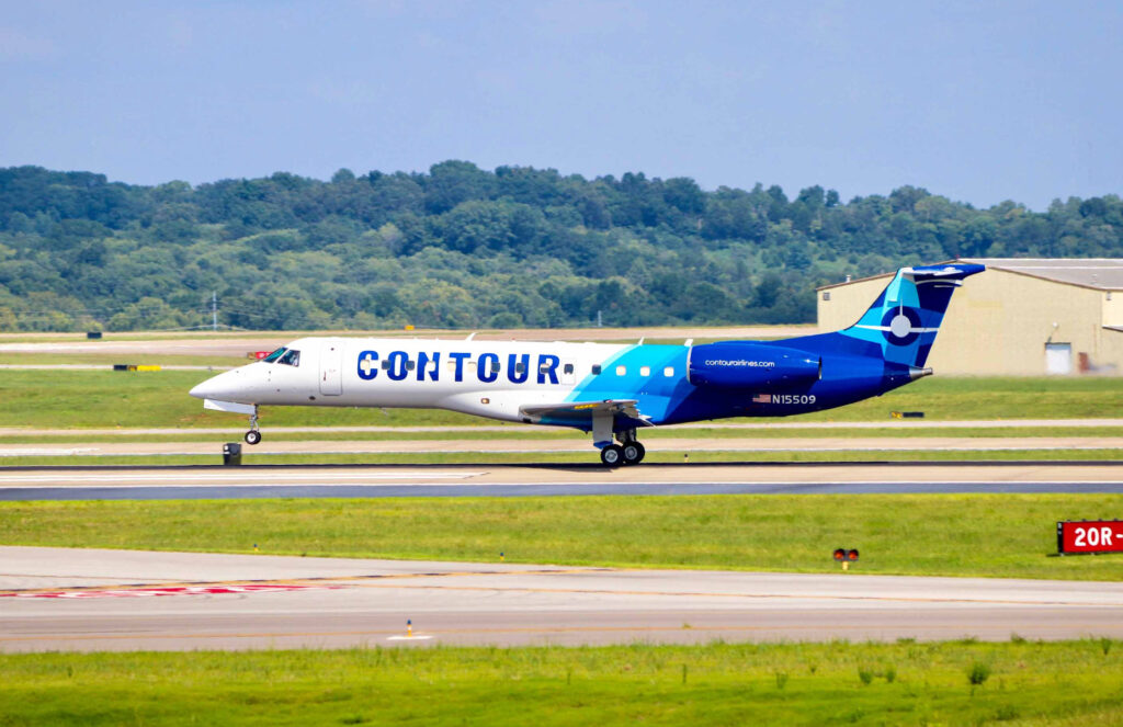 A Contour ERJ readies for takeoff. It features a blue, teal and white livery.