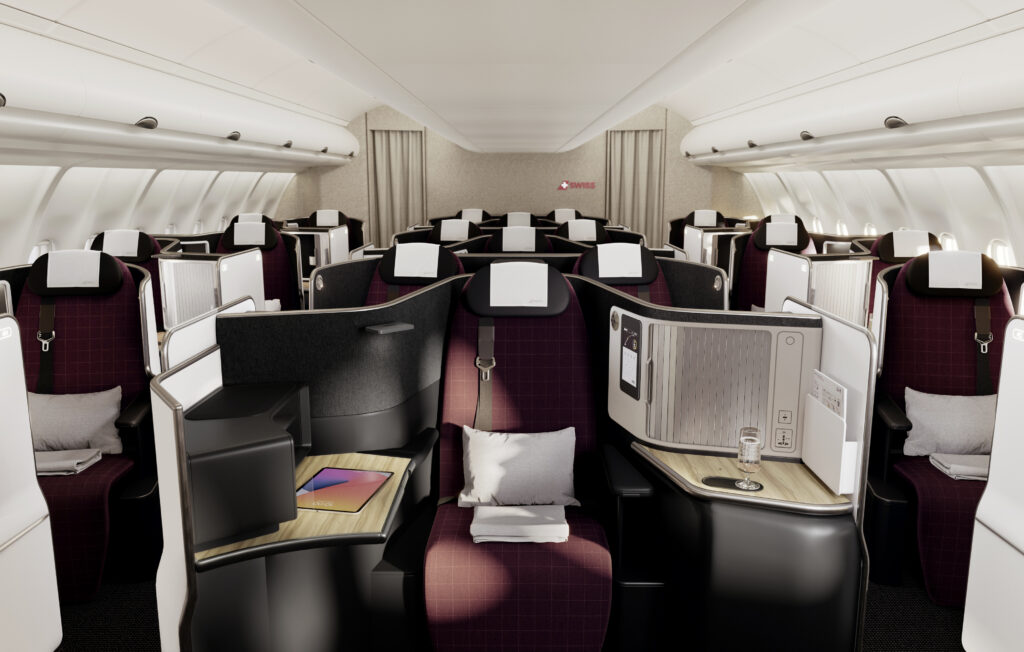 Swiss Senses Business Class seat. A Bordeaux seat with white thermoplastics and grey details.