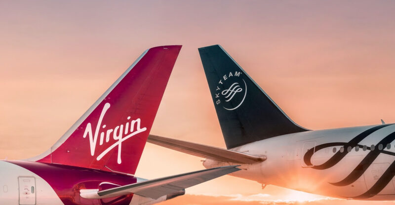 Virgin Atlantic And Sky Team aircraft tails in a photo during sunset.