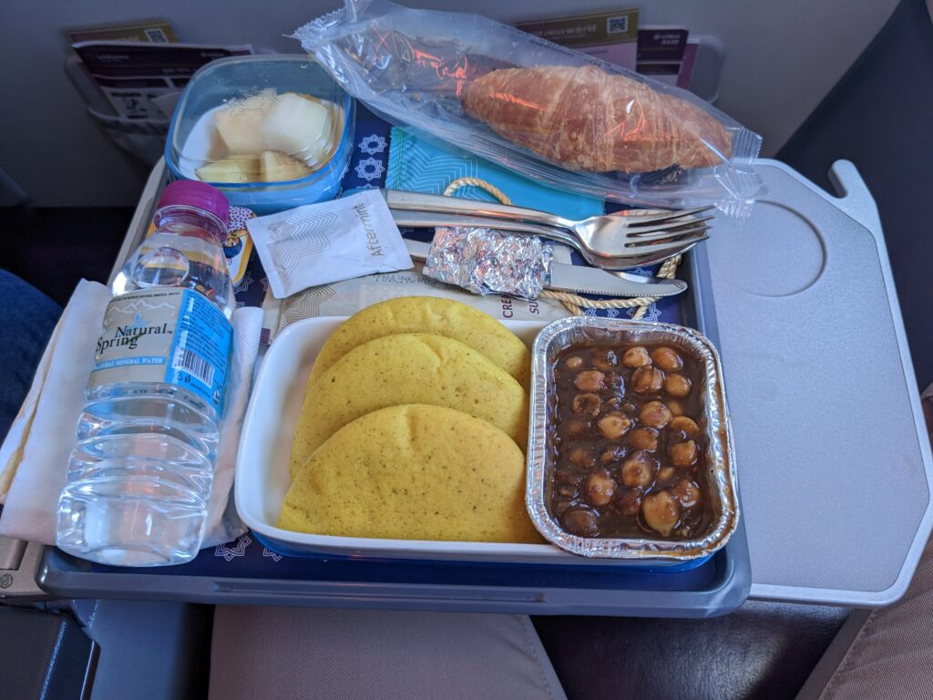 Indian breakfast on the Vistara A320neo Premium Economy in-seat tray table for bulkhead seats.