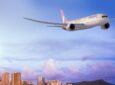 Hawaiian Airlines Boeing 787 Dreamliner in-flight at sunset.
