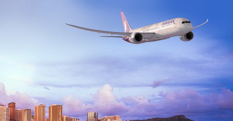 Hawaiian Airlines Boeing 787 Dreamliner in-flight at sunset.